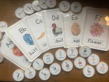 Load image into Gallery viewer, Watercolor Nature-Themed Alphabet Cards + Magnets/Tokens for Learning Alphabet - Flashcards Preschool + Homeschool - Set of 26 Wooden 2&quot; Coins - Montessori, Optional Memory Game
